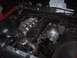 1992 Nissan 240SX - Engine bay with a turbocharger and custom piping, suggesting performance modifications.