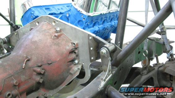 Engine block and transmission housing with custom metal brackets and suspension components