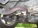 1999 Ford Taurus - The underside of a vehicle is captured, revealing suspension parts and the exhaust system.