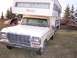 1979 Ford F-250 - This Ford F-250 pickup truck is equipped with a camper shell, suggesting it's set up for travel or extended stays.