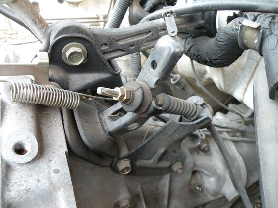 Throttle cable assembly with springs and mounting bracket