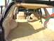 1984 Ford LTD - Interior view of a 1984 Ford LTD station wagon, showing the cargo space and front seating.