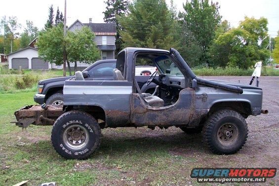1988 Chevrolet Blazer modified for off-road use, missing rear bumper and tailgate, with snorkel intake