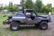 1988 Chevrolet Blazer - Modified 1988 Chevrolet Blazer with off-road tires and snorkel, parked next to another vehicle.
