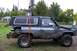 1988 Chevrolet Blazer - This heavily modified Chevrolet K5 Blazer features a snorkel and appears to be lifted, with another vehicle partially obscured behind it.