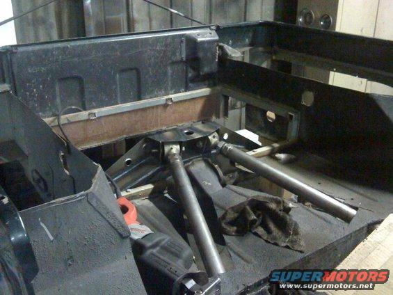 Jeep chassis interior with custom suspension components and metal bracing
