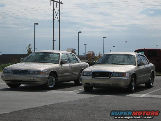 Two tan Mercury Grand Marquis sedans parked side-by-side in a lot