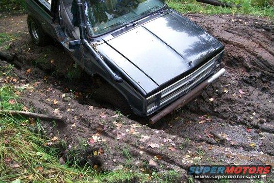 1988 Chevrolet Blazer stuck in mud, front 3/4 view