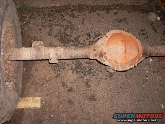 Rear axle assembly and wheel, rusty orange differential cover