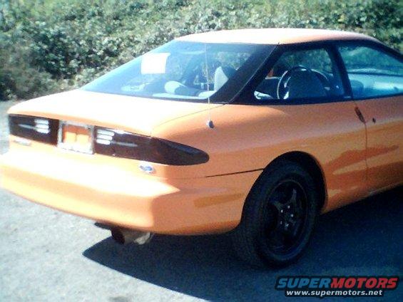 1995 Ford Probe rear view, orange coupe