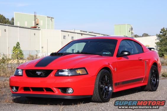 Red 2004 Ford Mustang coupe with black stripe on hood and side stripes