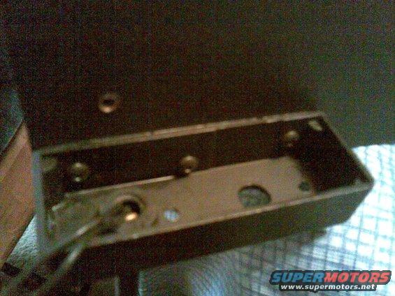 three 6-32 buttonhead screws slightly offset for stability hold on the maplight housing with no bracket