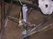 1900 Ford C-350 (Centurion Conversions) - A trailer frame is shown with a jack and a rusty bracket attached.