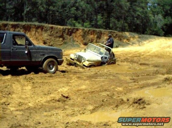 Pulling out a jeep.