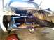 1969 Ford Mustang - The rear frame and trunk area of a car are visible, showing signs of restoration work. The Supermotors.net logo is present in the lower rig…