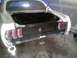 1969 Ford Mustang - The rear of a classic car is shown with the trunk open, indicating it is undergoing restoration or repair work.