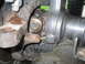 1984 Ford Bronco II - A detailed view of a vehicle's suspension system, showing mechanical components and wear.
