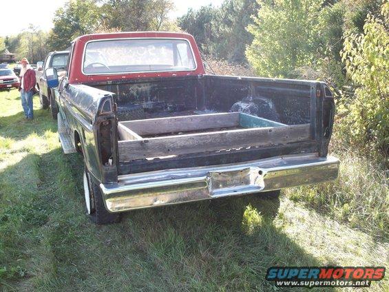 Rear view of a 1988 Ford F-150 with a wooden bed insert
