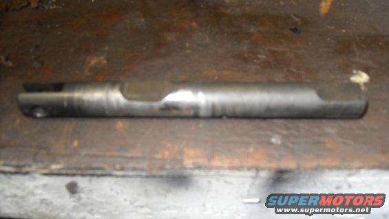Metal rod part with cutouts