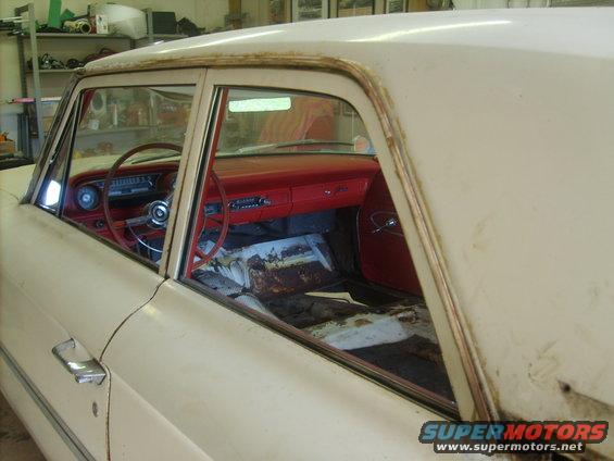 next I removed the window drip rail trim.  I use a paint can opener and gently pry down and out on the bottom of the trim.  Work your way toward the front slowly so you don't bend the trim.  