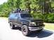 1994 Ford Bronco - This modified Ford Bronco is equipped for off-road adventures with its lifted suspension and auxiliary lighting.