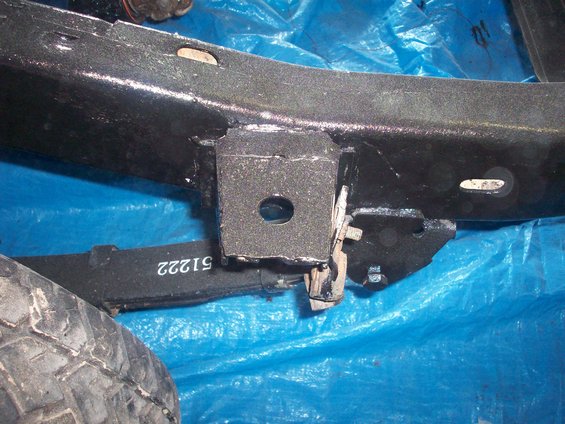 Black Jeep CJ frame with leaf spring showing part number 51222