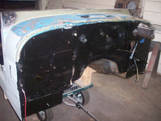 Jeep CJ5 firewall and fender assembly, partially prepped for paint. Master cylinder visible