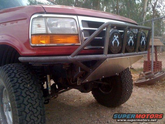 Red 1992 Ford Bronco front with custom bumper and lights