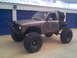 1984 Ford Bronco II - This heavily modified 1984 Ford Bronco II features a custom front bumper and oversized tires for off-road use.