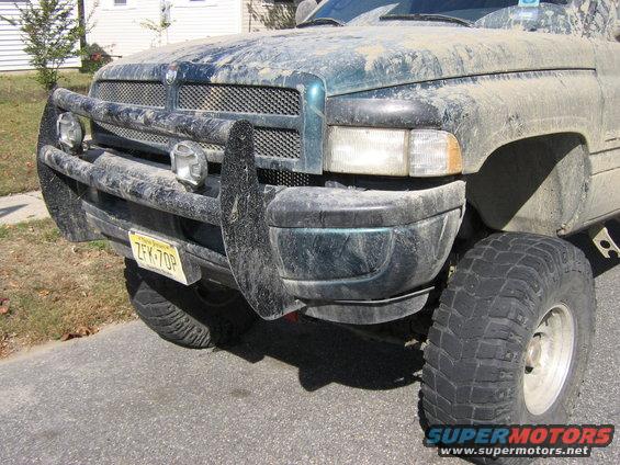 1998 Dodge 1500 front end with brush guard and yellow New Jersey license plate ZFK-70P