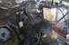 1992 Ford C-350 (Centurion Conversions) - The engine bay shows various components including the master cylinder, brake booster, and fluid reservoirs, with some transmission parts vi…
