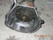 1991 Ford F-150 - A transmission torque converter housing is shown with its internal pump and splined shaft visible.