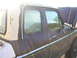 1975 Ford F-250 - 1975 Ford F-250 SuperCab in brown and white, showing its side profile with the hood open.