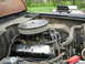 1973 Ford Bronco - Engine bay of a 1973 Ford Bronco shows a V8 engine with an aftermarket air filter assembly.