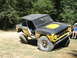 1973 Ford Bronco - This modified 1973 Ford Bronco is equipped for off-road adventures with its lifted suspension and tires.