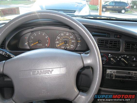 Gray Camry steering wheel and dashboard gauges. 1994 Toyota Camry
