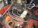 1971 Chevrolet Camaro - Engine bay detail showing carburetor, fuel lines, and other mechanical parts.
