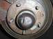 1971 Chevrolet Camaro - This close-up shows a wheel hub and brake rotor assembly, various stamped part numbers and markings.