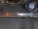 1971 Chevrolet Camaro - Underside view of a vehicle's driveshaft and transmission components, showing wear and rust.