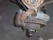 1971 Chevrolet Camaro - This image shows a close-up view of a vehicle's brake caliper and rotor, with visible rust and wear.