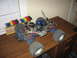 1992 Ford Ranger - A blue remote control monster truck sits on a wooden desk next to a rack of colorful tools.