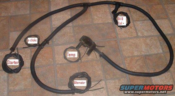 Been a while but im getting in gear!!!!

Tail light harness is in great shape so keeping that

I cleaned up my headlight harness and it is good to go

here is the engine bay harness. I borrowed one from someone and used his as a template for the wire loom. I think factory loom is 3/4" and I have 1/2" so boy is it tight... but all wires fit!!!!!