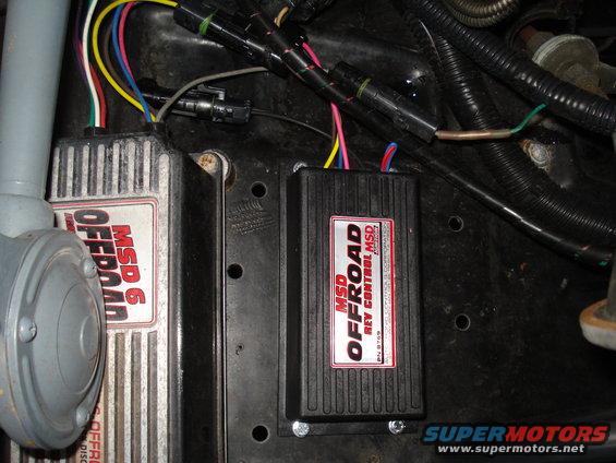 Two MSD ignition boxes, one labeled MSD 6 OFFROAD and the other MSD OFFROAD REV CONTROL, with wiring connected