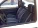 1989 Toyota Pickup/SR5 - View of the driver's side interior of a pickup truck, showing the seats and dashboard details.