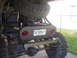 1984 Ford Bronco II - This heavily modified off-road vehicle features a custom rear end with a spare tire mounted above.
