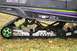 1990 Arctic Cat El Tigre EXT - Close-up of the undercarriage of an Arctic Cat snowmobile, focusing on the track and suspension components.