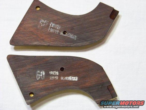Two dark wood trim pieces with white markings that say "60" and "SUPER BLACKHAWK"