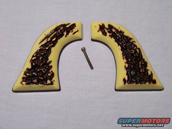 Pair of faux ivory gun grips with dark brown swirl pattern, and one screw