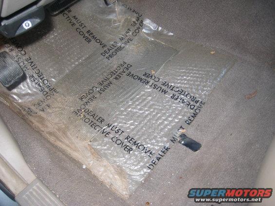 dump-20090628-077.jpg The Car only had 113,000kms on it and it still had the plastic on the carpets!!