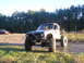 1984 Ford Bronco II - This modified 1984 Ford Bronco II is equipped for off-road adventures with its oversized tires and protective brush guard.